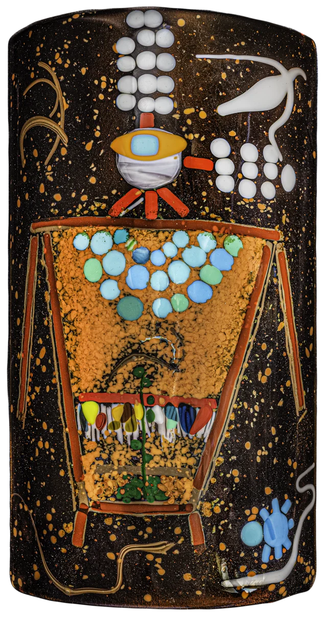 Tall fused glass panel with a bird motif on warm orange glass